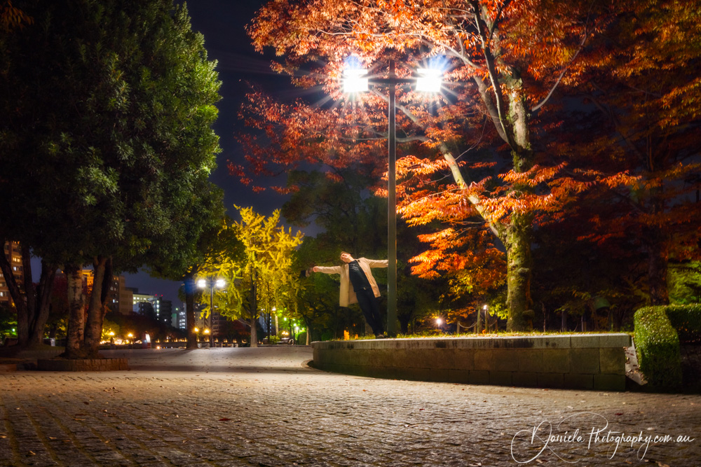 Hiroshima Peace Park Young Man feeling happy and exuberant in Autumn